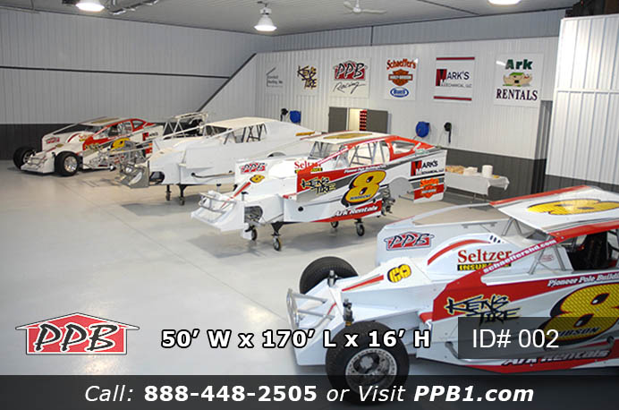 Clear span workshop interior of 002 50x170x16 commercial workshop building with race cars