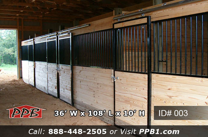 003 (36’Wx108’Lx10’H) 5 Full stall row interior of 003 36x108x10 15 stall horse barn with pine walls and black metal gates