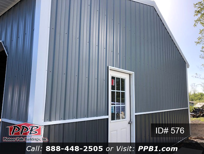 Pole Building Dimensions: 24’ W x 40’ L x 10’ 4” H (ID# 576) Two-Tone and Two Car Garage 24’ Standard Trusses, 4’ on Center 4/12 Pitch Colors: Two-Tone Siding Color: Upper Color: Slate Lower Color: Charcoal Roofing Color: Black Trim Color: White