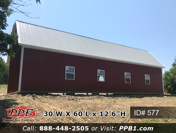 Pole Building Dimensions: 30’ W x 60’ L x 12’ 6” H (ID# 577) A Gambrel 3-Car Garage 30’ Gambrel Trusses, 2’ on Center Colors: Siding Color: Red Roofing Color: Ash Gray Trim Color: White