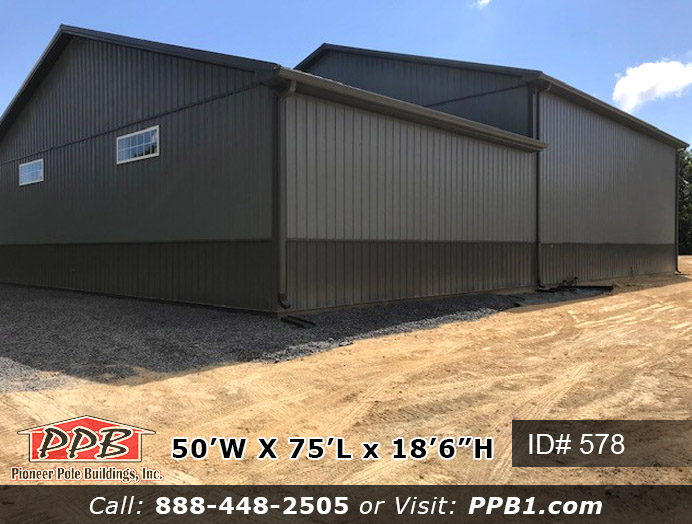 Pole Building Dimensions: 50’ W x 75’ L x 18’ 6” H (ID# 578) One Building with a Mezzanine and Partition Wall 50’ Standard Trusses, 4’ on Center 4/12 Pitch Colors: Two-Tone Siding Color: Upper Color: Slate Lower Color: Charcoal Roofing Color: Charcoal Trim Color: Charcoal