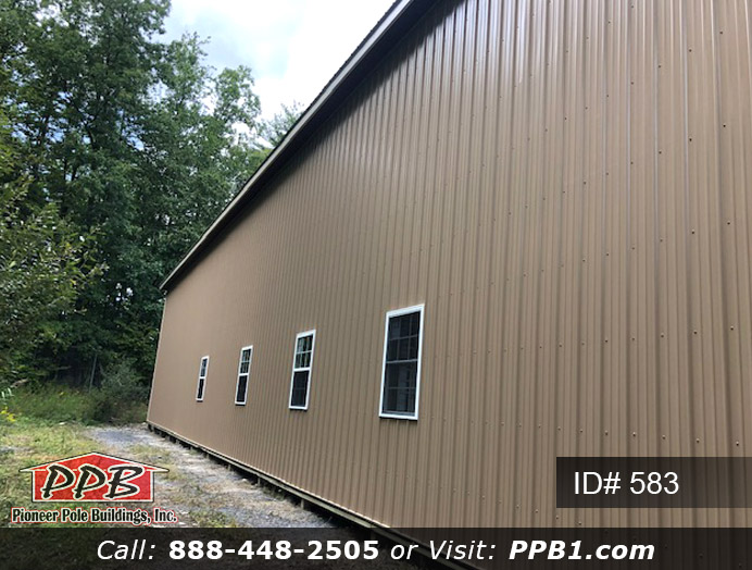 Pole Building Dimensions: 50’ W x 96’ L x 20’ 6” H (ID# 583) Big Storage Potential 50’ Standard Trusses, 4’ on Center 4/12 Pitch Colors: Siding Color: Tan Roofing Color: Brown Trim Color: Beige, White, & Brown
