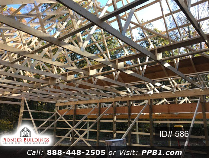 Pole Building Dimensions: 30’ W x 44’ L x 10’ 4” H (ID# 586) Ultra-Fine Three-Car Garage 30’ Standard Trusses, 4’ on Center 8/12 Pitch Colors: Siding Color: Brown Roofing Color: Red Trim Color: Brown & Red