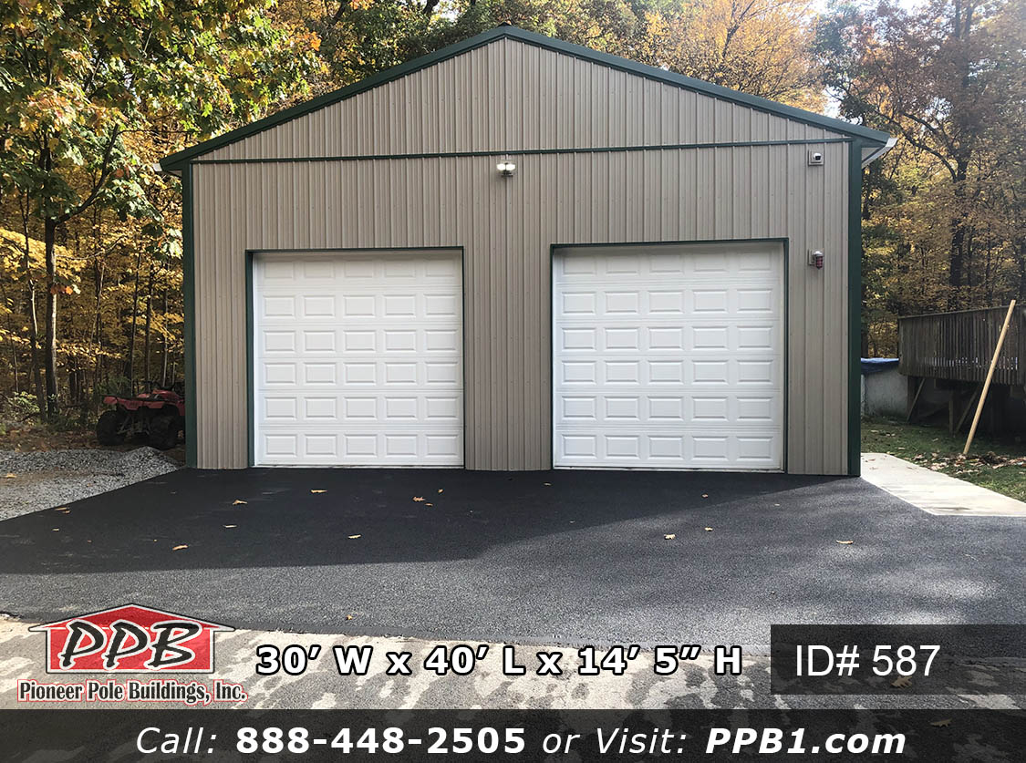 Pole Building Dimensions: 30’ W x 40’ L x 14’ 5” H (ID# 587) A Well-Lit Two-Car Garage 30’ Standard Trusses, 4’ on Center 4/12 Pitch Colors: Siding Color: Clay Roofing Color: Ivy (Green) Trim Color: Ivy (Green)