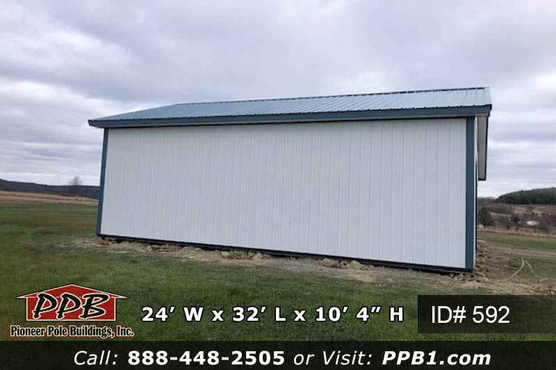 24’ W x 32’ L x 10’ 4” H (ID# 592) One Car Garage With Lean-To 24’ Standard Trusses, 4’ on Center 4/12 Pitch
