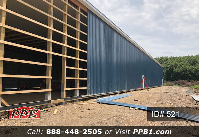 Pole Building Dimensions: 60’ W x 200’ L x 20’ 6” H (ID# 521) Big Blue Machine Shop 60’ Standard Trusses, 4’ on Center 4/12 Pitch Colors: Siding Color: Ocean Blue Roofing Color: Brite White Trim Color: Brite White Openings: (1) 20’ x 16’ Hi-Lift Commercial Garage Door (2) 10’ x 10’ Hi-Lift Commercial Garage Doors (6) 3068 6-Panel Insulated Entry Doors (1) 3068 9-Lite Insulated Entry Door (7) 3’ x 4’ Single-Hung Windows with Screens, Color: White 