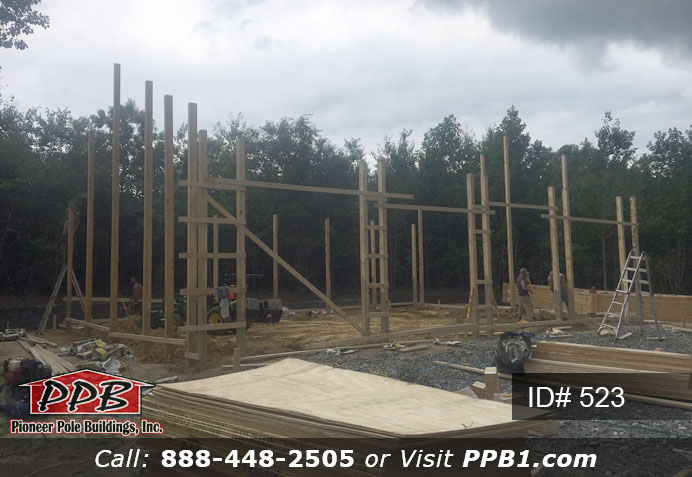 Pole Building Dimensions: 34’ W x 48’ L x 12’ 4” H (ID# 523) Gray Four-Car Garage with Shingles 34’ Standard Trusses, 2’ on Center 6/12 Pitch Colors: Siding Color: Slate Roofing Color: Charcoal (Shingles) Trim Color: Brite White Openings: (4) 9’ x 10’ Carriage House Garage Doors with 2-Piece Arched Stockton Windows & Dutch Corners (1) 12’ x 12’ Split-Slider Door, Color: Slate (1) 3068 6-Panel Insulated Entry Door (1) 3’ W x 4’ H Single-Hung Window with Grids & Screens 