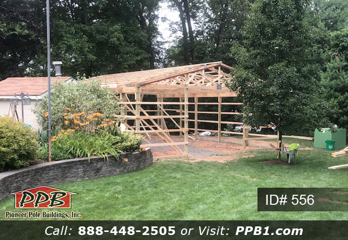 Pole Building Dimensions: 30’ W x 40’ L x 10’ 4” H (ID# 556) Pole Building with Sliding Doors 30’ Standard Trusses, 4’ on Center 3/12 Pitch Colors: Two-Tone Siding Color: Upper Color: Tan Lower Color: Red Roofing Color: Red Trim Color: Red