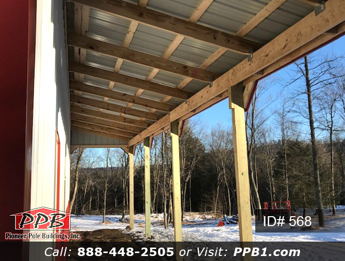 Pole Building Dimensions: 30’ W x 40’ L x 12’ 4” H (ID# 568) A Workshop with a Porch 30’ Standard Trusses, 4’ on Center 4/12 Pitch Colors: Two-Tone Siding Color: Upper Color: Brite White Lower Color: Red Roofing Color: Red Trim Color: Red
