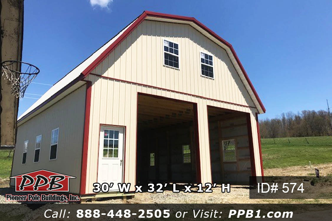 30’ W x 32’ L x 12’ H A Gambrel Garage with a Second Floor 30’ Gambrel Trusses, 2’ on Center Colors: Siding Color: Beige Roofing Color: Ash Gray Trim Color: Red