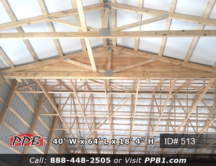 Custom Pole Building Dimensions: 40’ W x 64’ L x 18’ 4” H (ID# 513) 40’ Standard Trusses, 4’ on Center 4/12 Pitch Colors: Siding: Upper Color: Tan Lower Color: Red Roofing Color: Red Trim Color: Red Openings: (2) 14’ x 14’ Garage Doors with Windows (1) 10’ x 10’ Garage Door with Windows (2) 3068 9-Lite Entry Doors (Insulated) (8) 3’ x 4’ Single-Hung Windows with Screens & No Grids