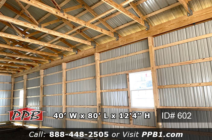 Farm Building Dimensions • 40’ W x 80’ L x 12’ 4” H (ID# 602) • 40’ Standard Trusses, 4’ on Center • 4/12 Pitch Farm Building Colors • Siding Color: Slate • Roofing Color: Slate • Trim Color: Ocean Blue Farm Building Openings • (2) 14’ x 12’ Split-Slider Non-Insulated Doors, Color: Slate • (2) 3068 6-Panel Fiberglass Insulated Entry Doors • (4) 3' x 4' Single-Hung Insulated White Windows with Screen & Grids