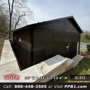 30x32 post frame building gable corner with bronze siding and black roof