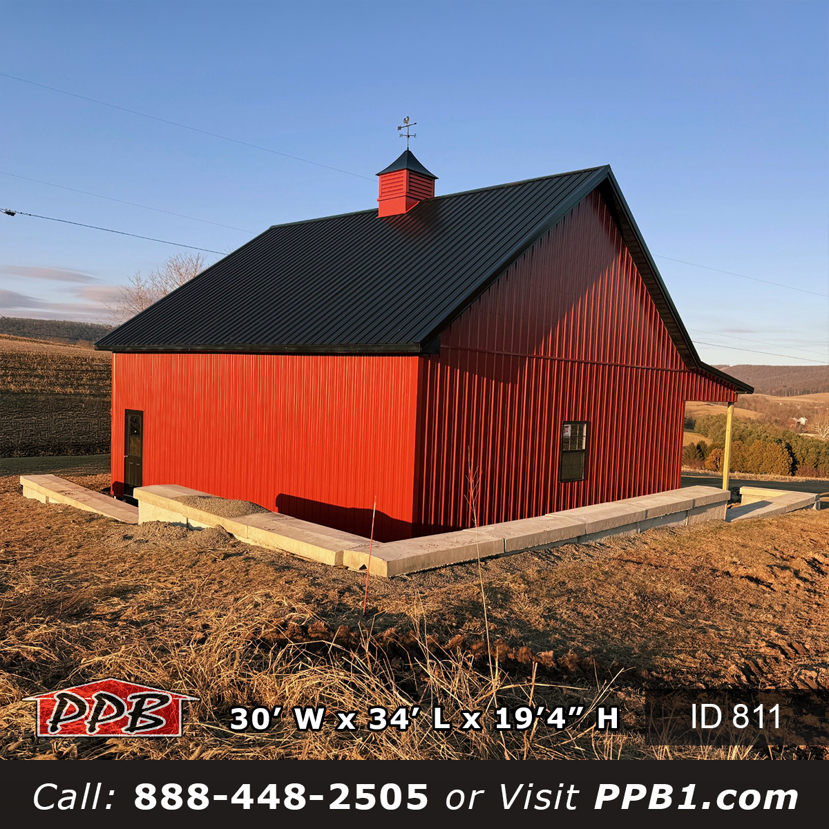 rear view of red metal garage with two story structure