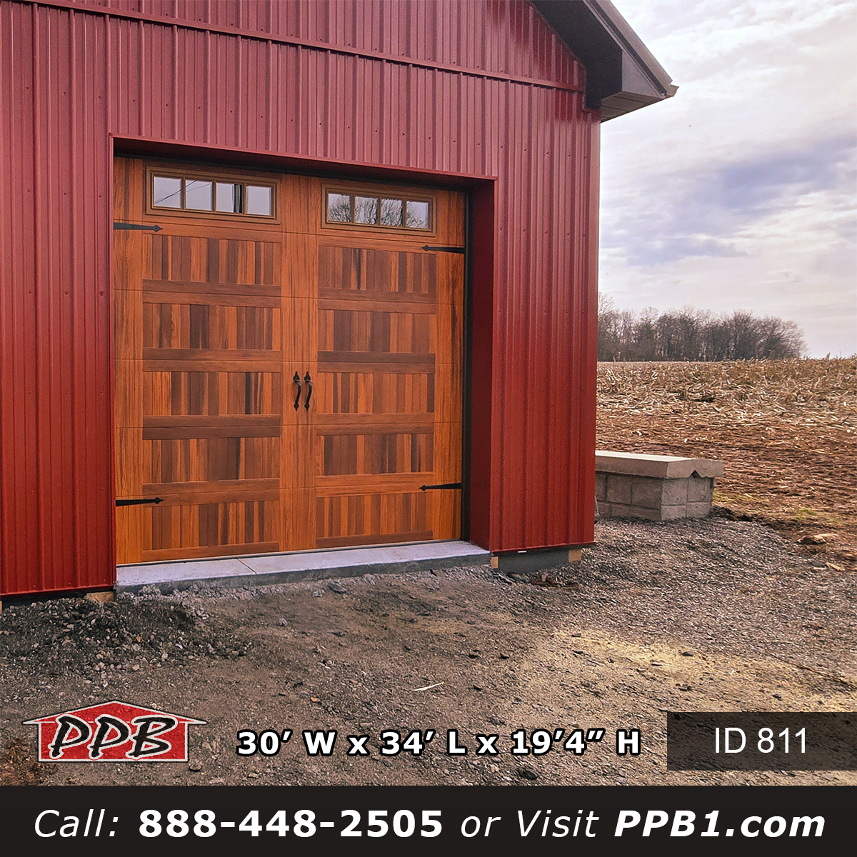Carriage house garage doors with cedar accents on red metal garage
