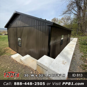Pennsylvania garage building rear elevation with black gutters and downspouts