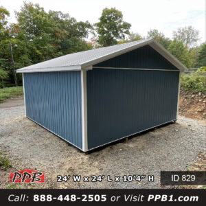 Rear gable and long wall of a 24x24 post frame garage on a gravel pad in New Jersey